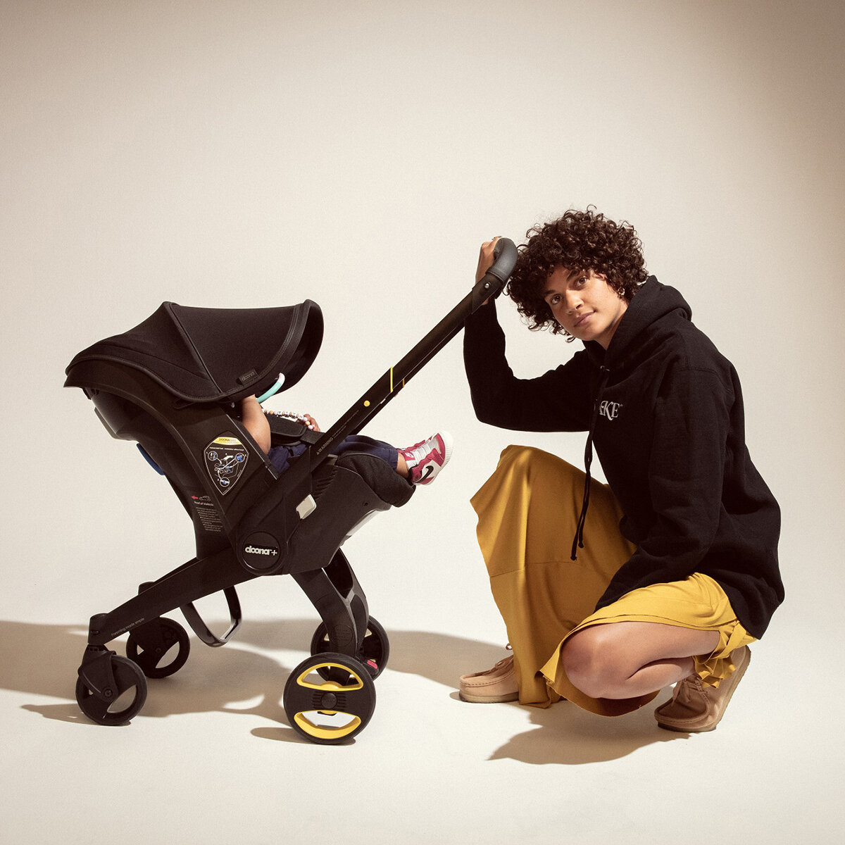 Doona Autoasiento + Base Midnight